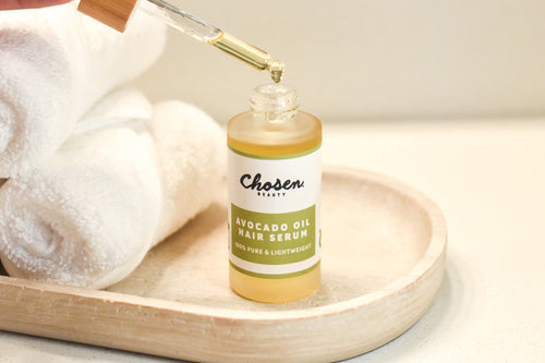 Chosen Beauty Avocado Oil Hair Serum Bottle with Dropper showing a drop 