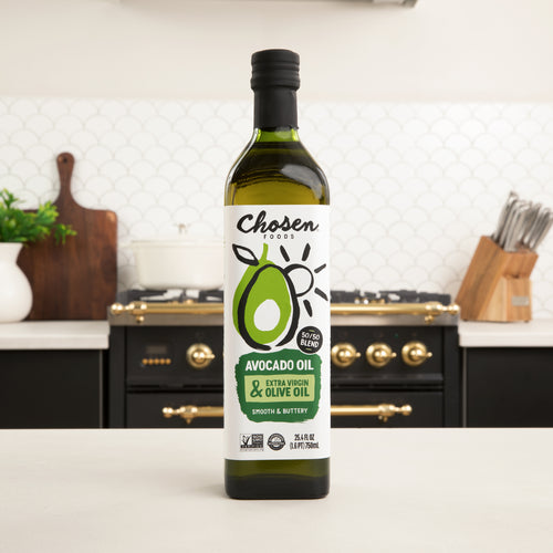 50/50 Blend 100% Pure Avocado + Extra Virgin Olive Oil 750ml Bottle - View Front Bottle with Kitchen in the background. 